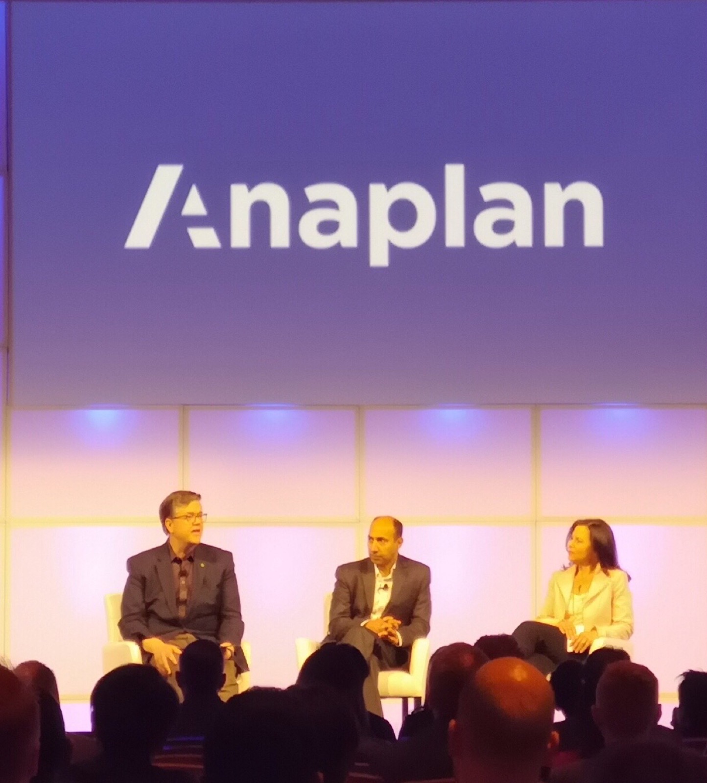 Panel discussion on stage at an Anaplan conference
